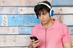 photo of man wearing headphones